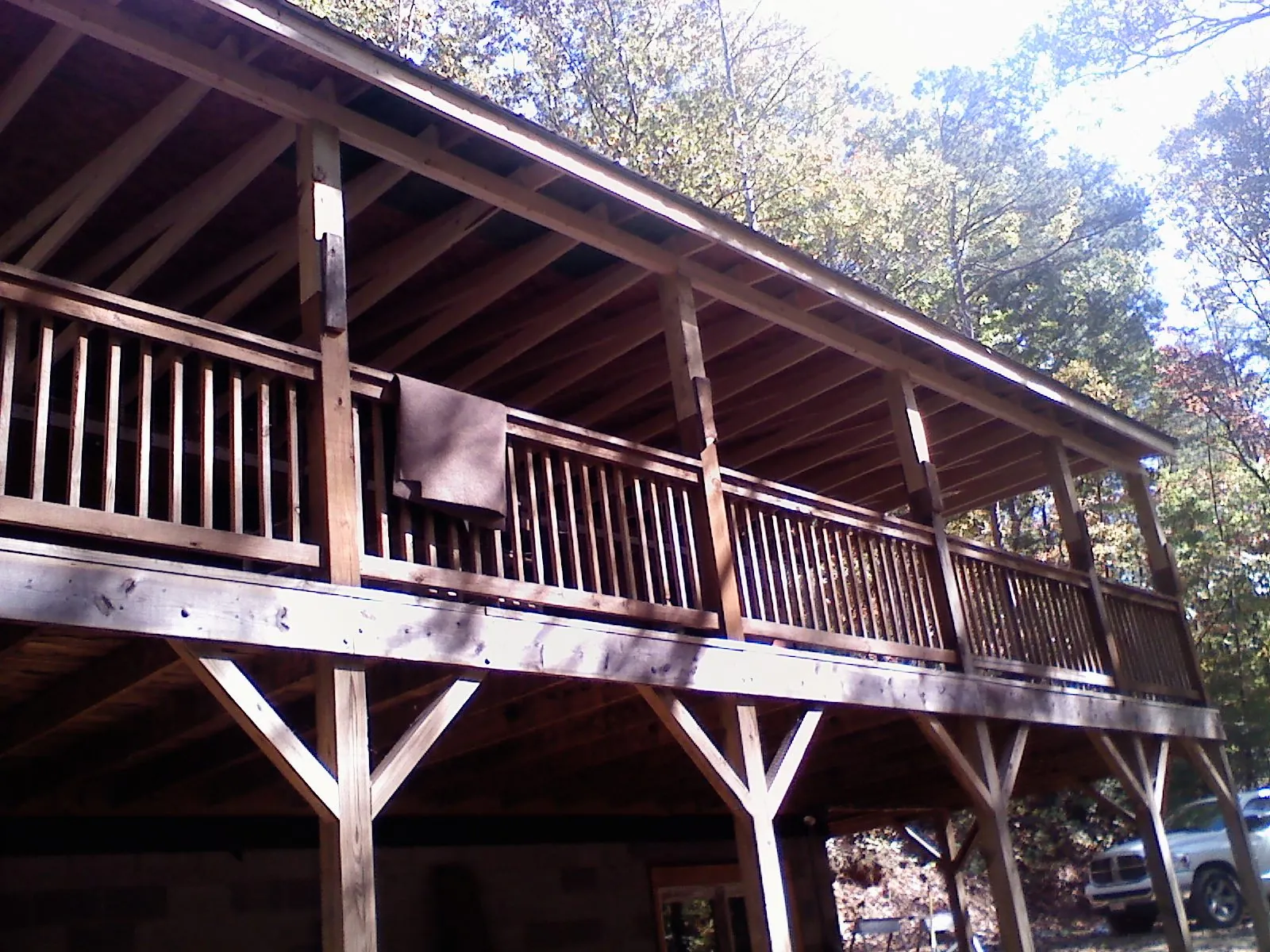 Timber framing under a new elevated porch and deck — Roof Leak Repair in Clearville by Roofing Brothers